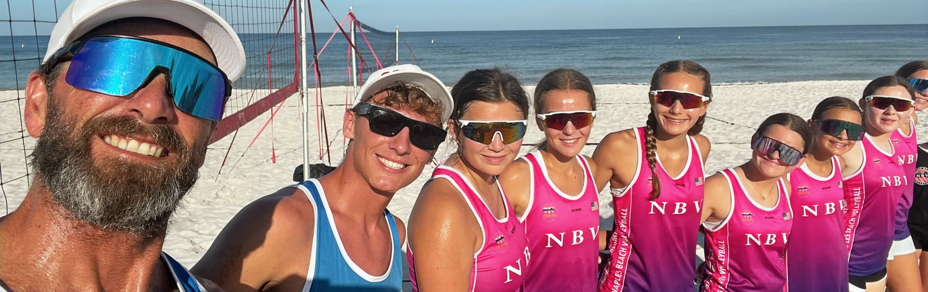 Naples Beach Volleyball players and coaches together on the sand