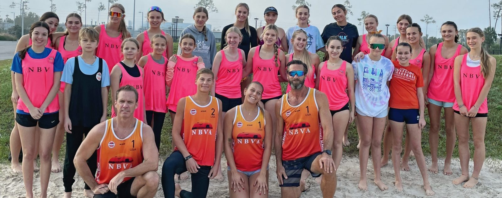The full Naples Beach Volleyball junior squad together on the beach