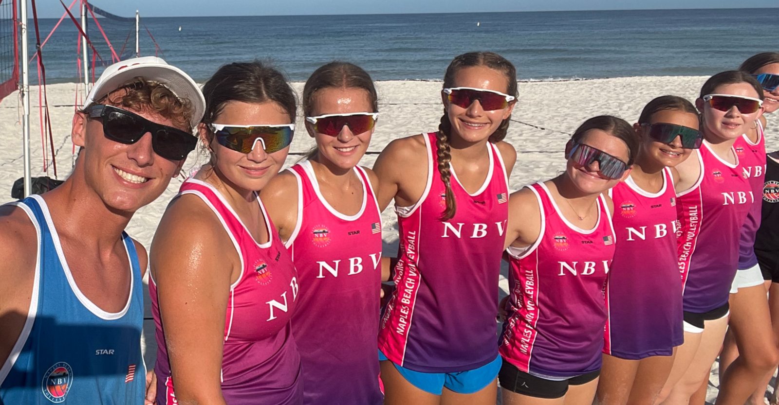 Naples Beach Volleyball junior team lined up in NBV jerseys